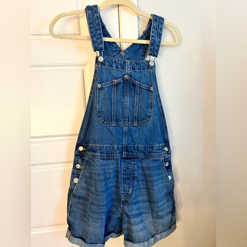 Blue denim overalls